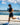 Man running outdoors as part of a daily movement routine and active lifestyle
