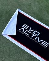 Midnight black EVOActive gym towel with thin red and broad white border and branded text at the centre