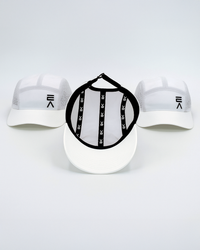 Studio product image of three Evo Ice white EVOActive Unisex Core Run Caps, with one cap shown from the inside displaying the EVOActive logo