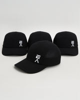 Studio product image of four midnight black EVOActive Unisex Core Run Caps, all showing the front, with one cap in front at a slight side angle and logos visible against a bright background
