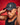 Close-up view of man wearing midnight black EVOActive Core Vented Run Cap with logo visible against a red background