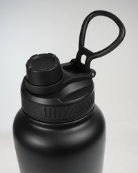 Top view of midnight black EVOActive Fusion-Sip bottle highlighting spill-resistant lid for hot and cold drinks
