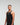 Front view of man wearing midnight black EVOActive Men’s Aero Singlet in a slight side pose with logo visible