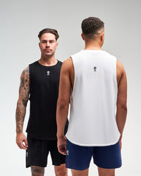 Two men wearing EVOActive Men’s Flex Singlet in Evo Ice white and midnight black, facing each other in half-body view with logos visible against bright background