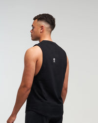 Back view of man wearing midnight black EVOActive Men’s Flex Singlet in a slight side pose with logo visible
