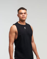 Front view of man wearing midnight black EVOActive Men’s Flex Singlet in a slight side pose with logo visible