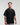 Close-up upper-body view of man wearing midnight black EVOActive Unisex Classic Tee with logo visible against a bright plain background